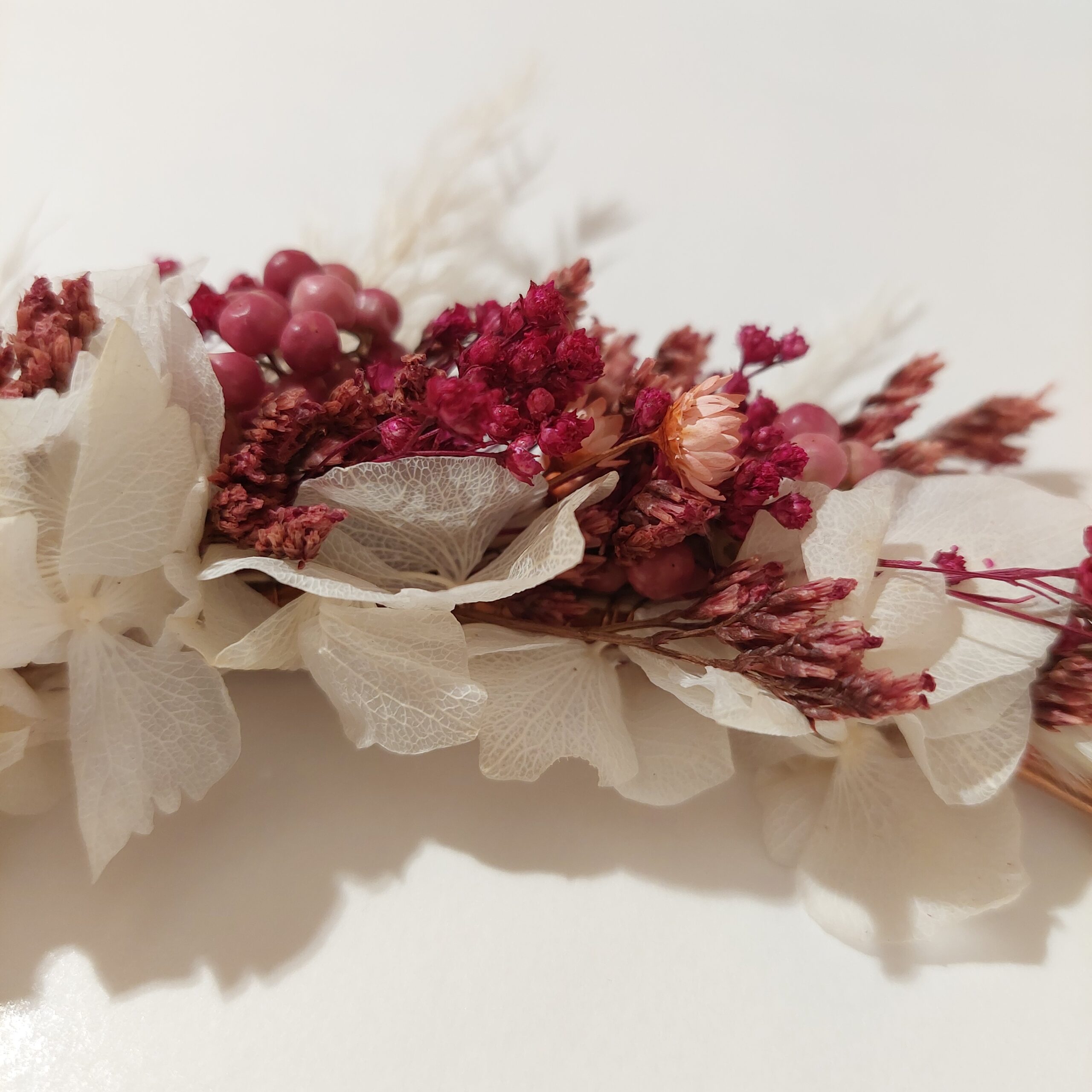 couronne de fleurs rose poivre